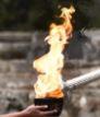 Flamme olympique et flambeau sécuritaire